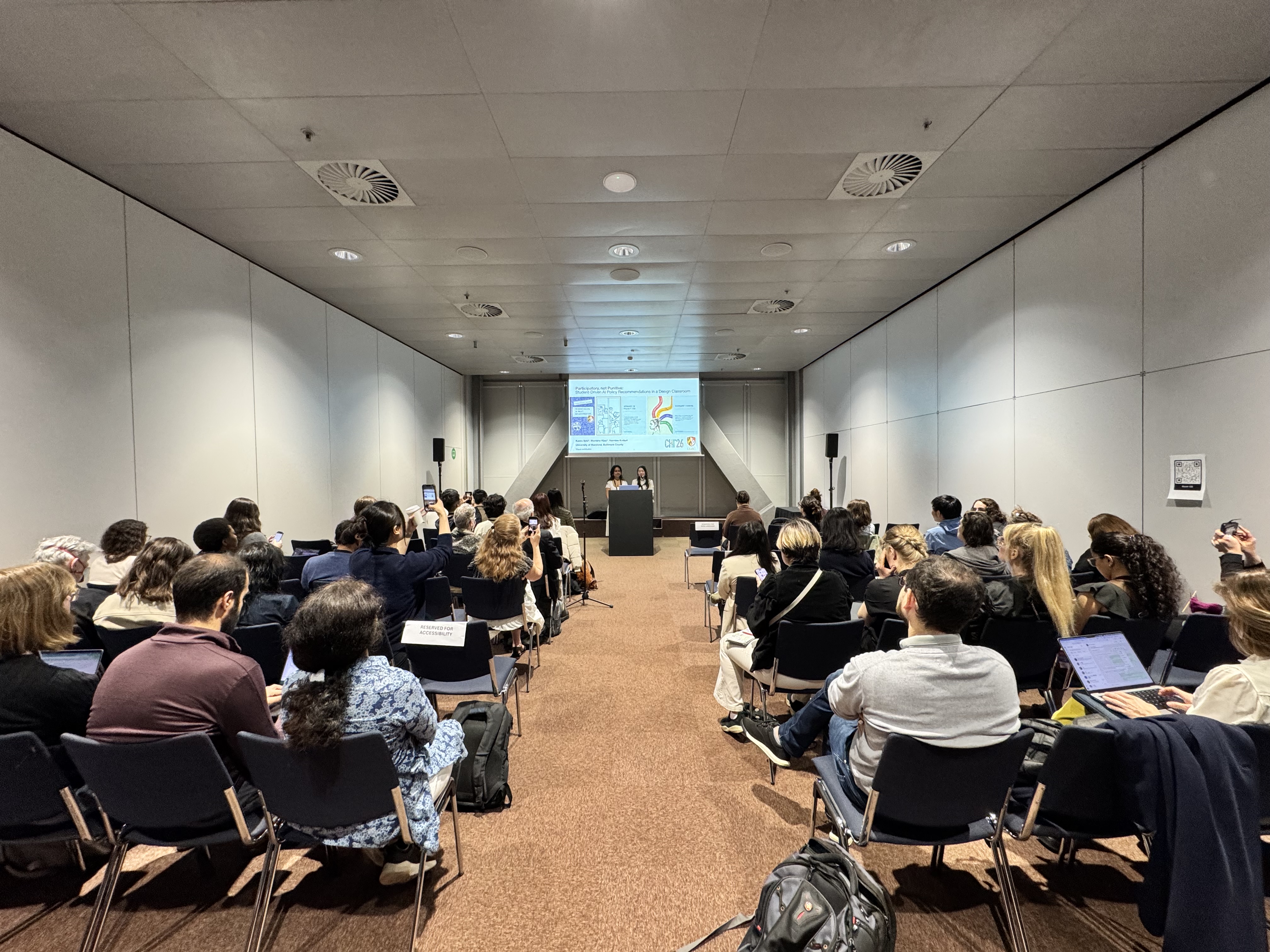 Kaoru Seki and Manisha Vijay presenting at CHI 2026