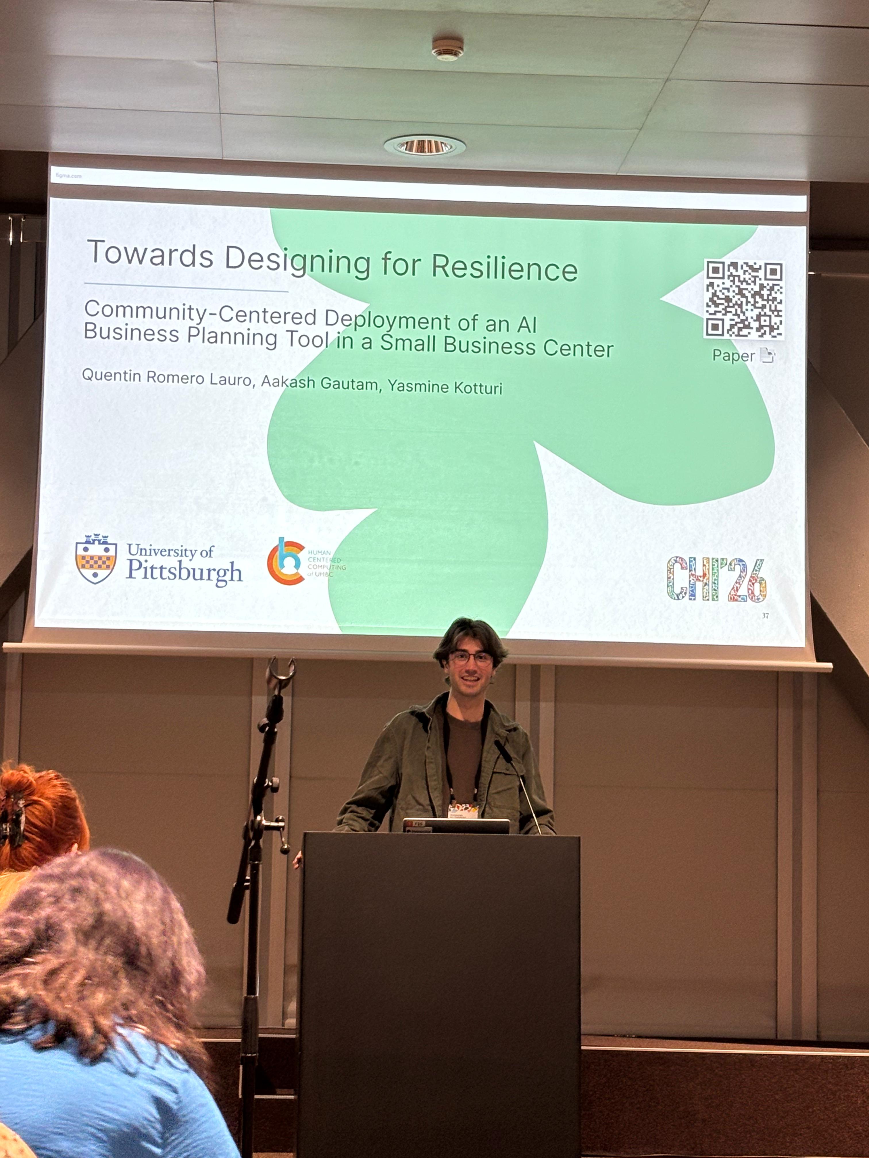 Quentin Romero Lauro during the BizChat CHI 2026 talk